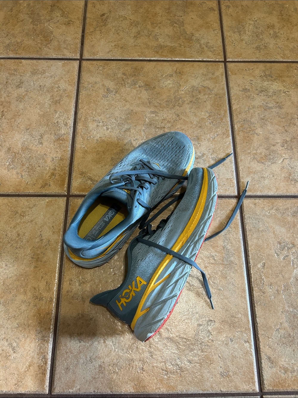 Hoka Lightweight Running Shoes in Blue with Yellow Accents